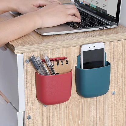 Triadic remote control organizer